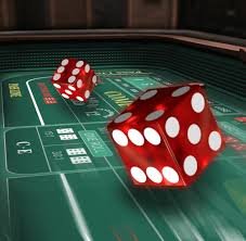 Layar tabel pembayaran Caishen Wins menampilkan nilai simbol dan fitur bonus